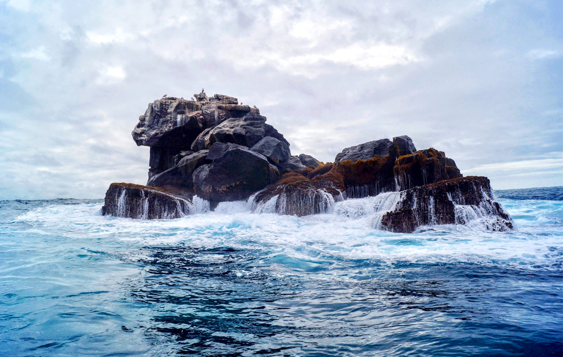 Rock formation rising from the sea